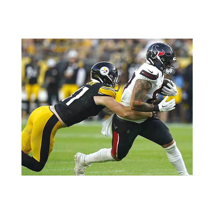 Pre-Sale: Payton Wilson Signed Stretched Out Tackling Texans Photo