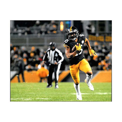 Xavier Grimble Running with Football Unsigned 8x10 Photo