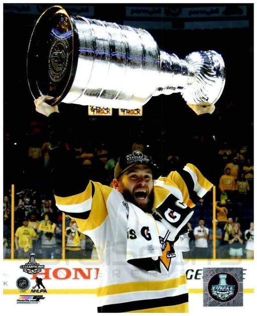 Bryan Rust Raising 2017 Stanley Cup Framed 8x10 Photo - Unsigned