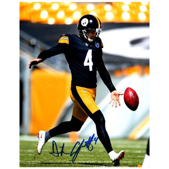 Dustin Colquitt Autographed Punting in Black 11x14 Photo