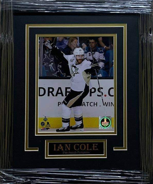 Ian Cole - Framed 8x10 Hands Up White Uniform - Unsigned