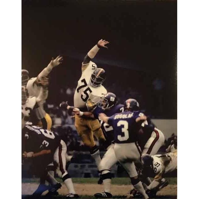 Joe Greene Unsigned Jumping in White 8x10 Photo