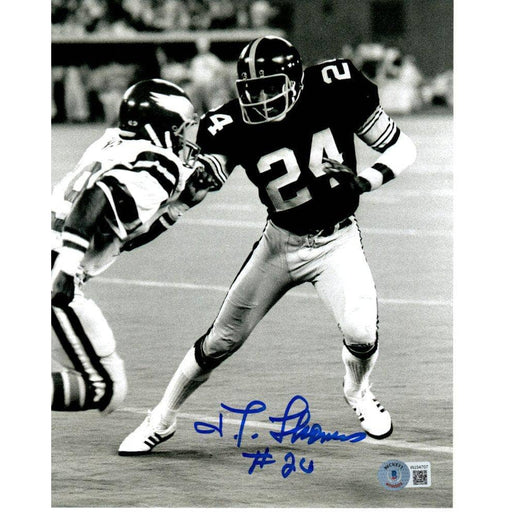JT Thomas Autographed Defending Against Eagles 8X10 Photo