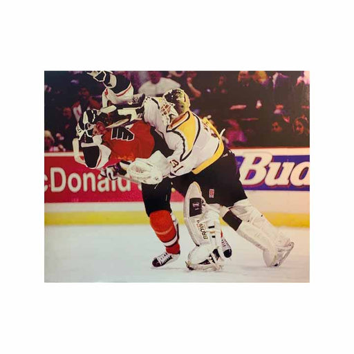 Marc-Andre Fluery Blocking Black with Gold Pads Unsigned 8x10 Photo