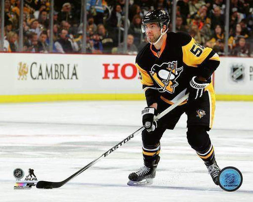 Kris Letang In Alternate Jers. With Stick On Ground Unsigned Licensed 8X10 Photo