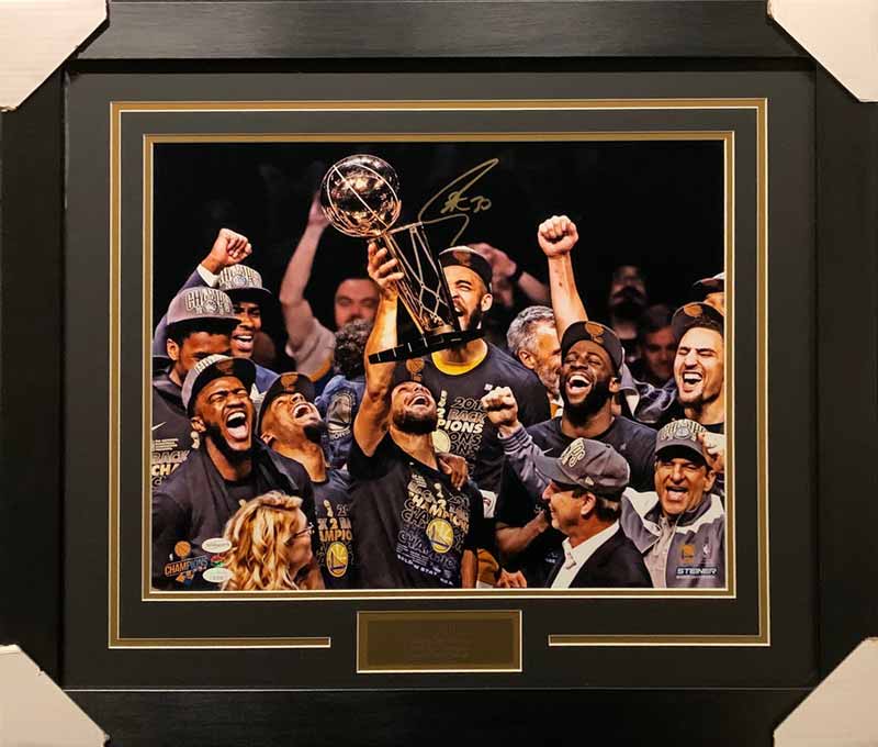 Stephen Curry Autographed Raising Trophy with Team 16x20 Photo - Professionally Framed